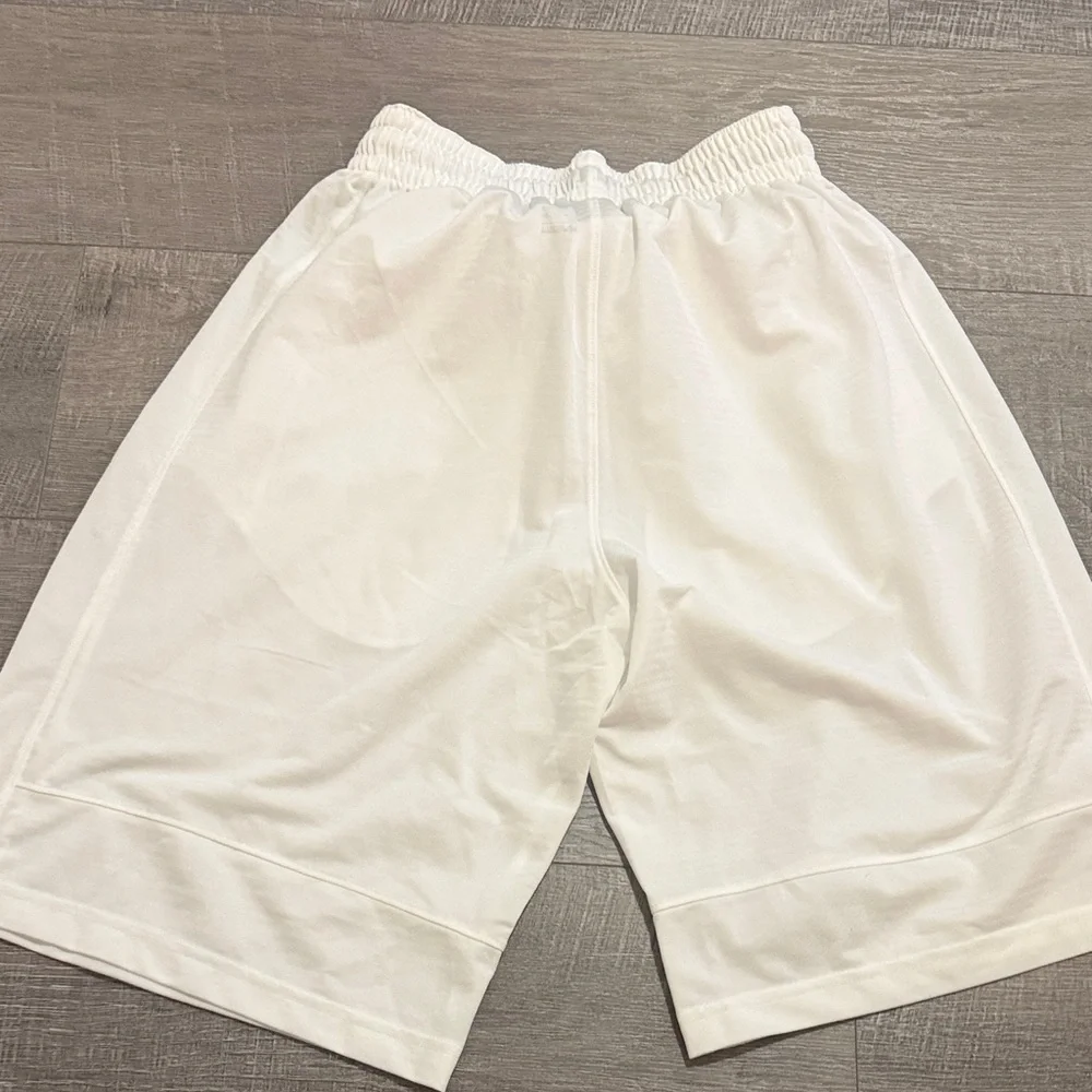 Nike Men's White Athletic Shorts with Black Swoosh